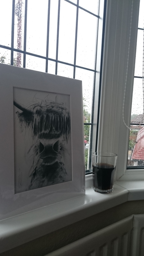 Rainy day window, complete with cow. 